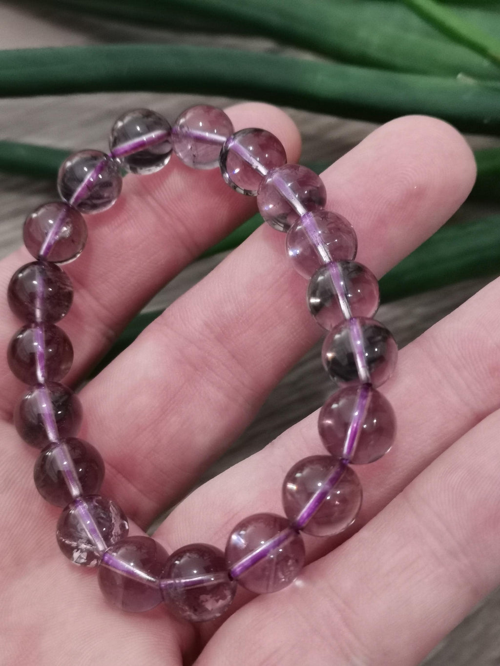 Amethist uit Bolivia AAA, armband van ronde kralen 10 mm / Top lithotherapie