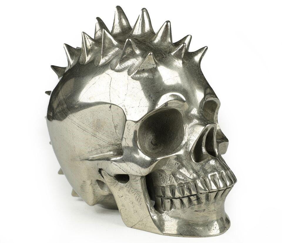 Magnificent Pyrite, Stone Skull carved in PUNK / Pique style