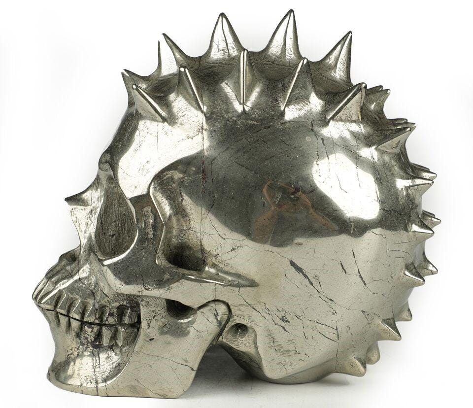 Magnificent Pyrite, Stone Skull carved in PUNK / Pique style