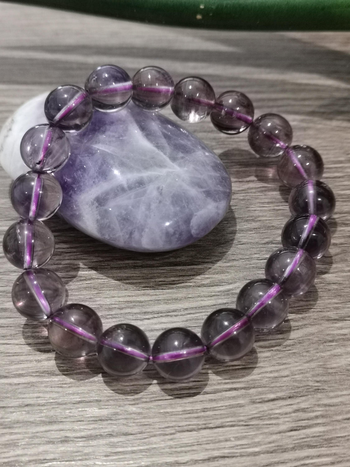 Amethist uit Bolivia AAA, armband van ronde kralen 10 mm / Top lithotherapie