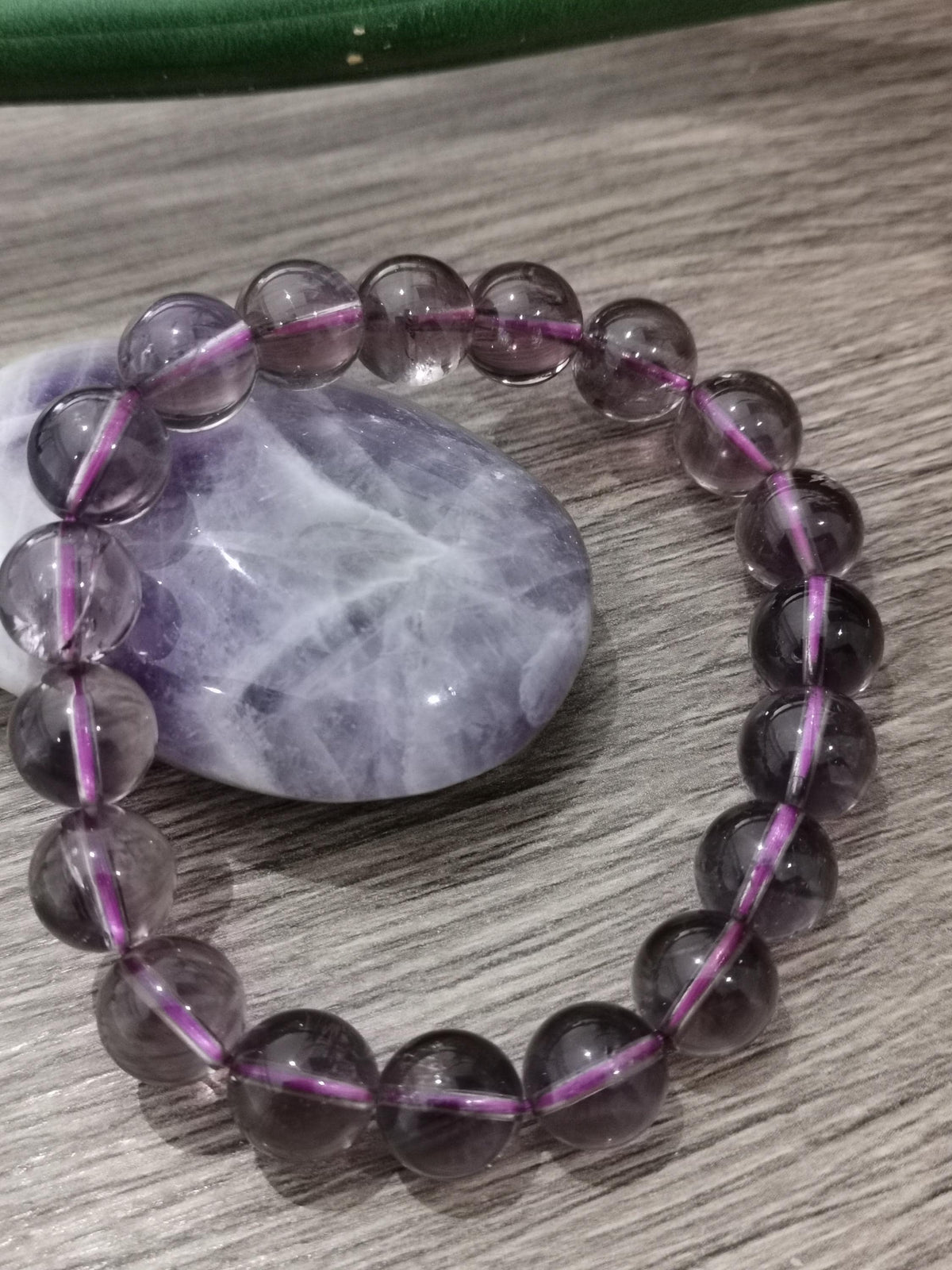Amethist uit Bolivia AAA, armband van ronde kralen 10 mm / Top lithotherapie