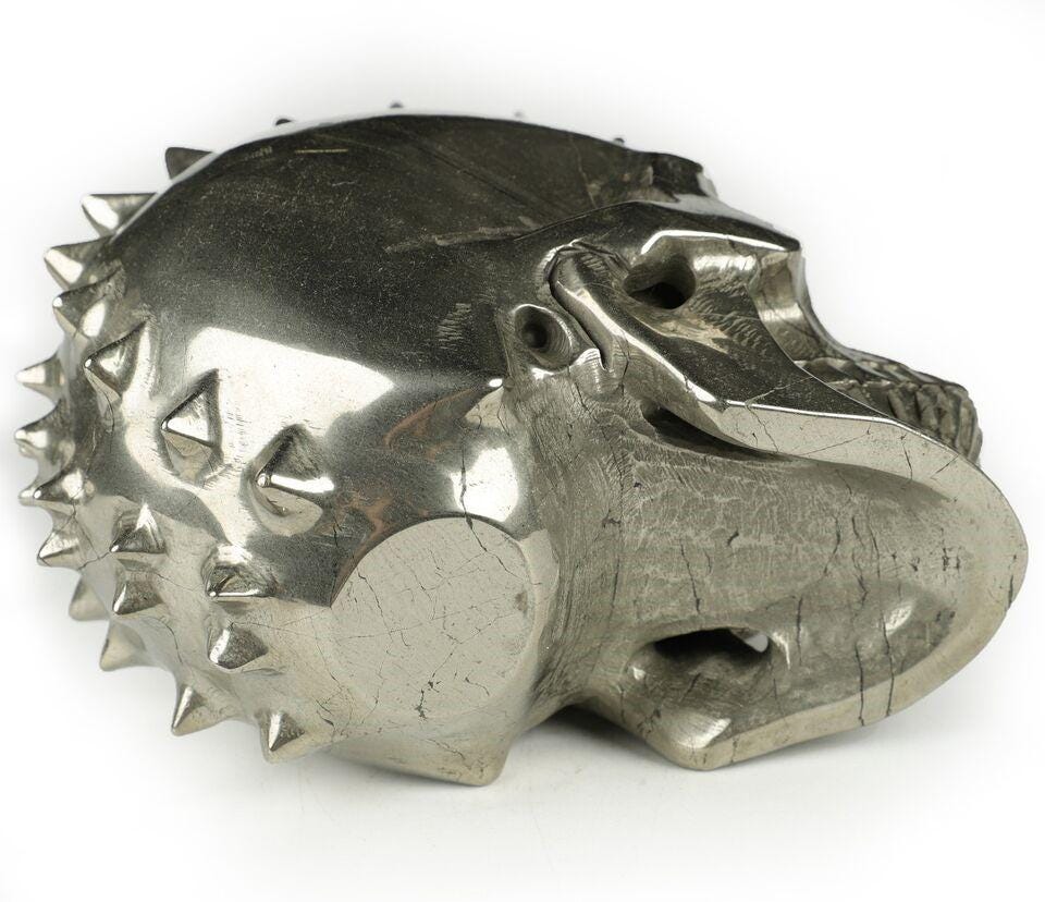 Magnificent Pyrite, Stone Skull carved in PUNK / Pique style