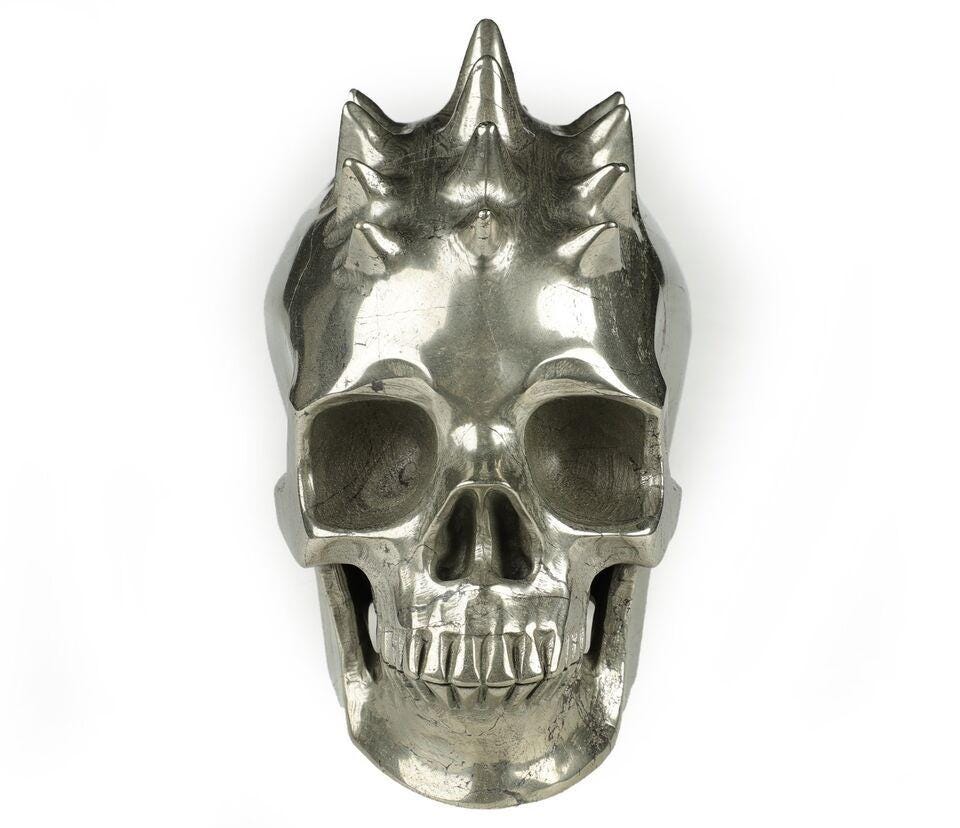 Magnificent Pyrite, Stone Skull carved in PUNK / Pique style