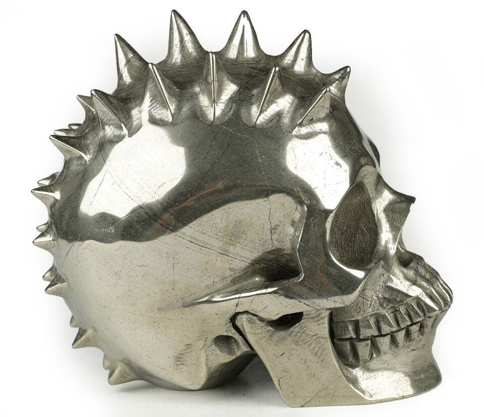 Magnificent Pyrite, Stone Skull carved in PUNK / Pique style