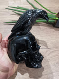 Skelet en raaf van zwart obsidiaan · Collectiebeeldhouwkunst